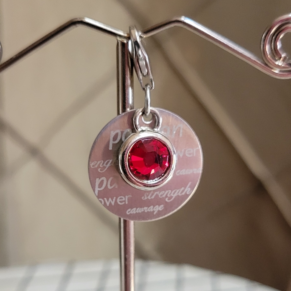 EUC- RARE- Retired Touchstone Crystal by Swarovski Red 'Passion' Crystal Charm